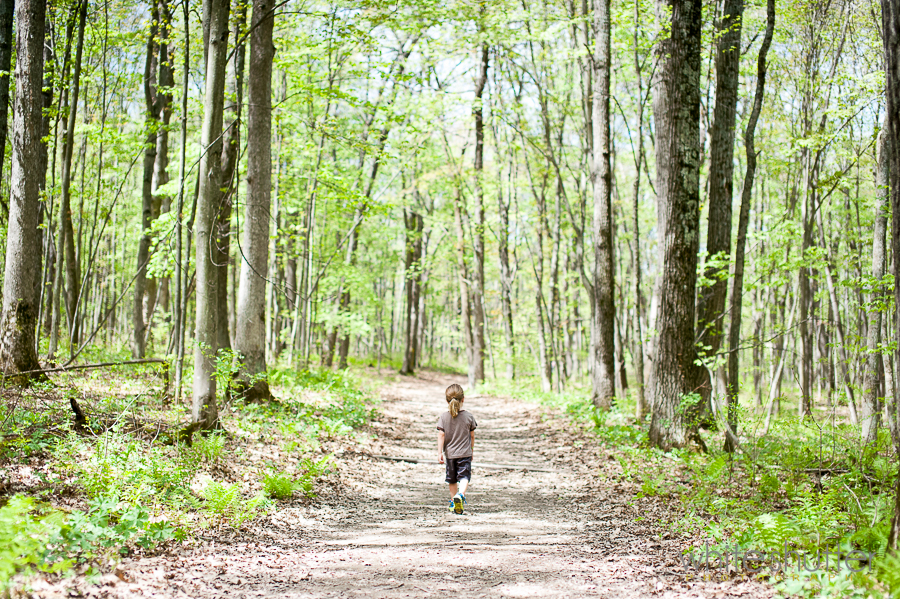a boy walking with nature